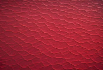 A smooth, abstract background featuring a gradient of deep red hues with subtle textures. A close-up view, create a dynamic pattern. The rich red color adds depth and warmth to the image.