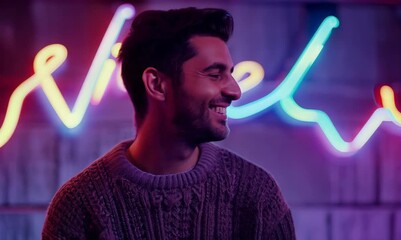 Conceptual portrait video of a satisfied man in his 30s wearing a cozy sweater against neon lights background - Powered by Adobe