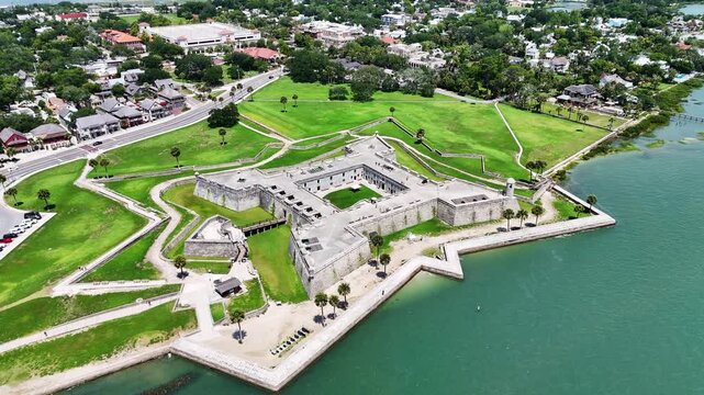 Wide rotating drone shot of Castillo de San Marcos in St. Augustine, Florida.