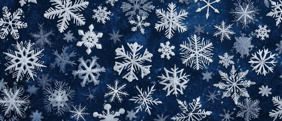 A beautiful collection of white snowflakes on a dark blue background, perfect for winter-themed designs and holiday projects.