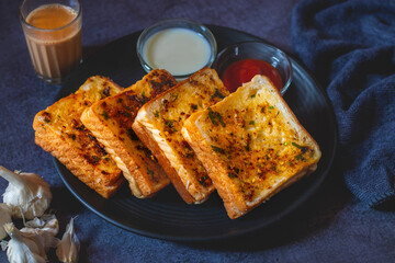 Delicious Homemade Garlic Bread Recipe, Perfectly Buttery serve with sauces.