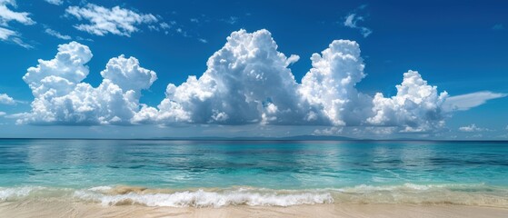 Obraz premium Serene Tropical Sky with Fluffy Clouds Blanketing the Vast Ocean Horizon