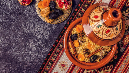 Traditional moroccan tajine of chicken with dried fruits and spices.