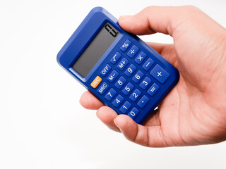 A man holding a calculator.