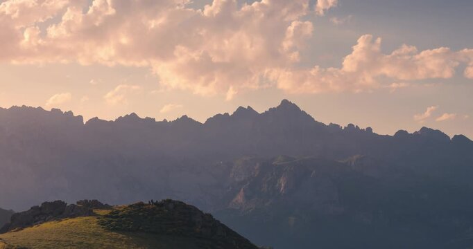 Close up detail shot View of Picos de Europa Mountain Range with beautifull golden light rays during sunset view from collado de Llesba in Northern Spain, Cantabria.