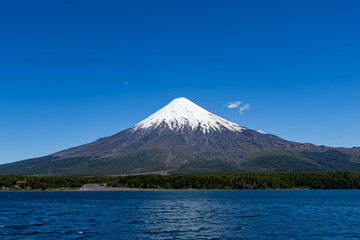 Todos los Santos (Allsaints) lake with the snow-capped Osorno volcano in the background, Vicente Rosales National Park, Puerto Varas, Chile.