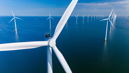 Sustainable Wind Turbines Harnessing Energy Off the Dutch Coast at Dusk © Fokke Baarssen
