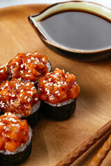 Japanese sushi roll with a tartar cap