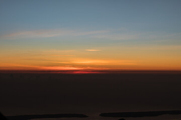 horizon line with orange color when the sun rises in the morning