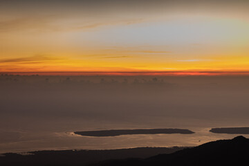 horizon line with orange color when the sun rises in the morning