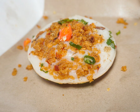 street food from Indonesia, Serabi Oncom. Serabi is shaped like a pancake whose main ingredients are rice flour topped with egg, oncom or egg and oncom