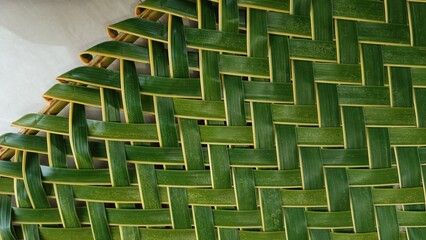  zig zag interlace green coconut palm leaf , green foliage interlace texture close up
