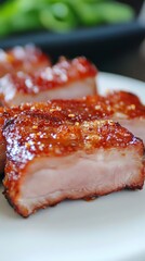 A tempting close-up photo of juicy, grilled pork ribs with a caramelized crust, arranged on a white plate, ideal for BBQ enthusiasts looking for a mouth-watering meal.