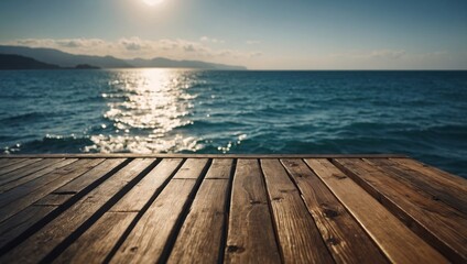 Fototapeta premium Blurred sea background with wood resort deck floor foreground.