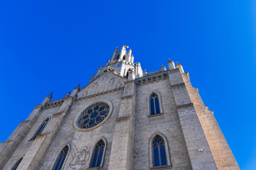 tower and spire of the gothic old ancient Catholic Cathedral. Polish Church Cathedral of the Sacred Heart of Jesus in Tashkent in Uzbekistan, Asia