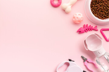 Pet supplies on a pink background: includes dog food, chew toys, water bottle, and grooming tools. Perfect for pet care and accessory themes