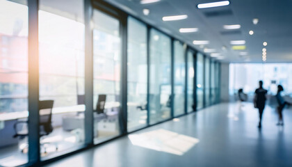 Blurred empty open space office. Abstract light bokeh at office interior background; modern business architecture concept photography