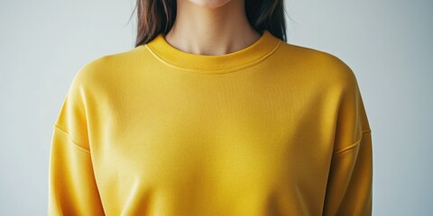 Woman in Yellow Sweatshirt and Black Pants