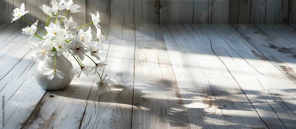 Aufkleber White flowers casting hard shadows are placed on a wooden surface with the vase s shadow visible on the floor beside them creating a serene copy space image