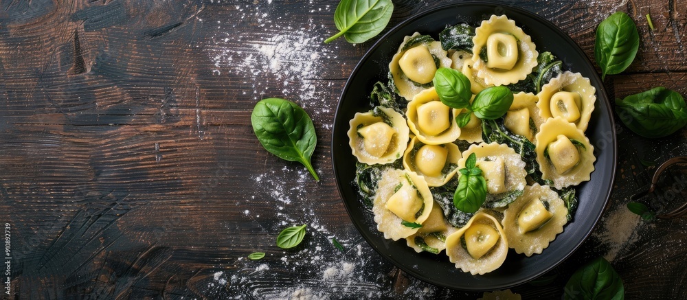 Aufkleber top view of traditional italian tortelli pasta filled with spinach and cheese with copy space image 