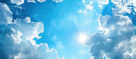 The expansive blue sky with fluffy clouds perfect for a copy space image