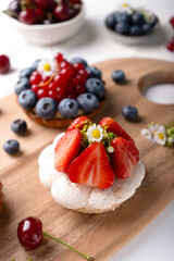 Berry Desserts Assortment, Seasonal Pastry over Bright Background