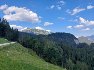 Mountains of Kamnik–Savinja Alps. Green nature of Slovenia. Blue sky.