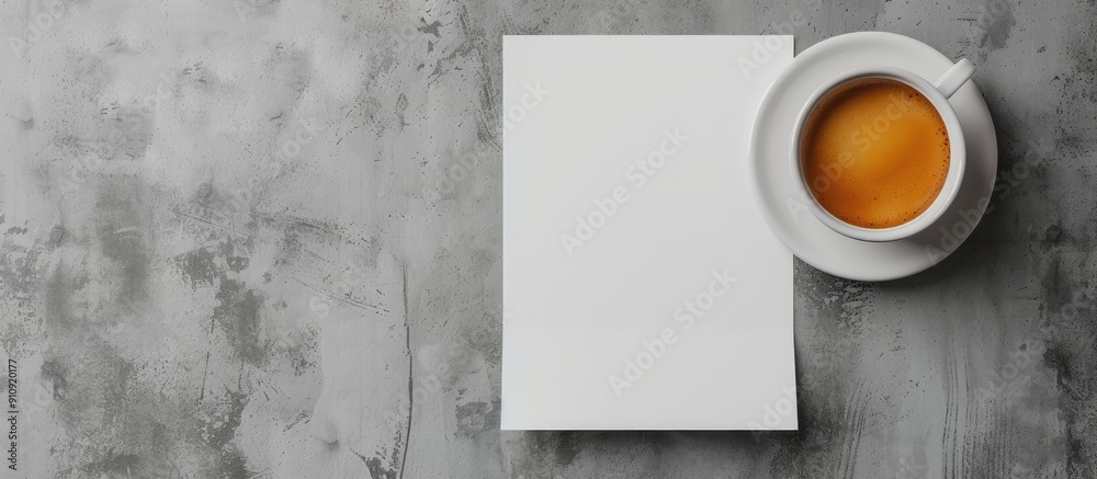Poster Top view of a mockup featuring blank paper and a cup of coffee on a gray concrete background perfect for adding your own content in the copy space image