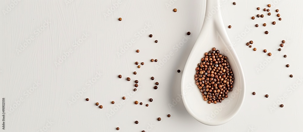 Poster a top view studio shot of brassica hirta mustard seeds in a white spoon on a white background with s