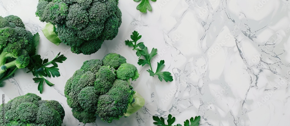 Poster Fresh green broccoli in a flat lay arrangement on a light background with a designated area for additional text or images known as copy space image