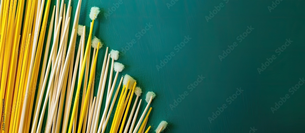 Aufkleber Floss toothpicks on a background with copy space image in yellow and green tones