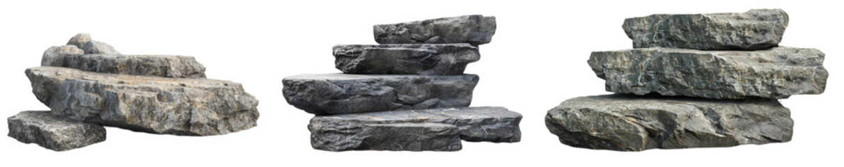 Various stone slabs arranged in a stack, showcasing different textures and shades, perfect for construction or design elements