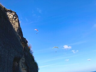 paraglider over the mountains on a summer day