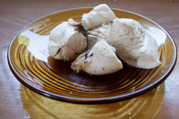 Boiled chicken on the small plate