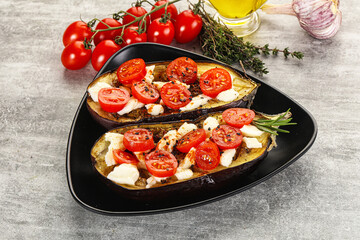 Baked eggplant with cheese and tomato