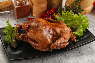 Baked small chicken with spices