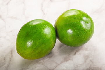Two ripe green exotic avocado fruit