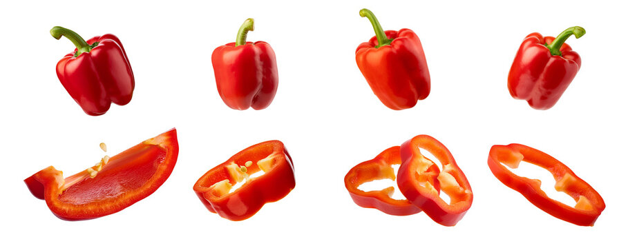 Red bell peppers in various stages of slicing, showcasing fresh and vibrant vegetables perfect for cooking and nutrition.
