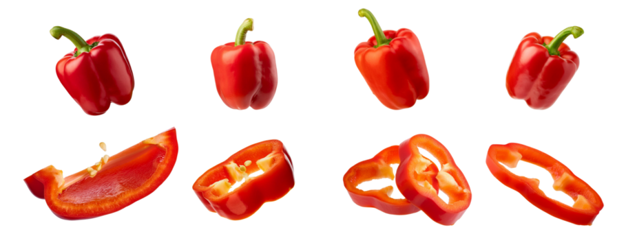 Red bell peppers in various stages of slicing, showcasing fresh and vibrant vegetables perfect for cooking and nutrition.