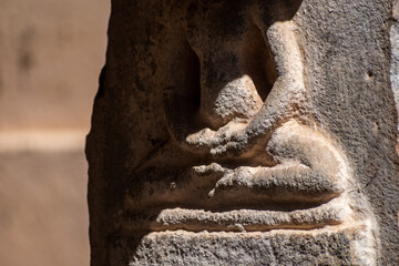 Ancient carving of a Jain monk meditating on a pillar of an old temple in Shravanabelagola