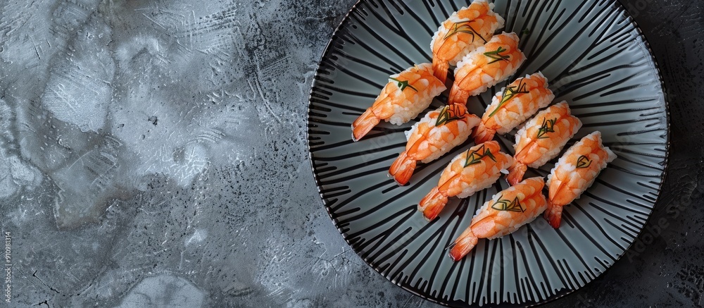 Poster An aerial photograph captures shrimp sushi arranged on a gray plate with ample copy space image around it
