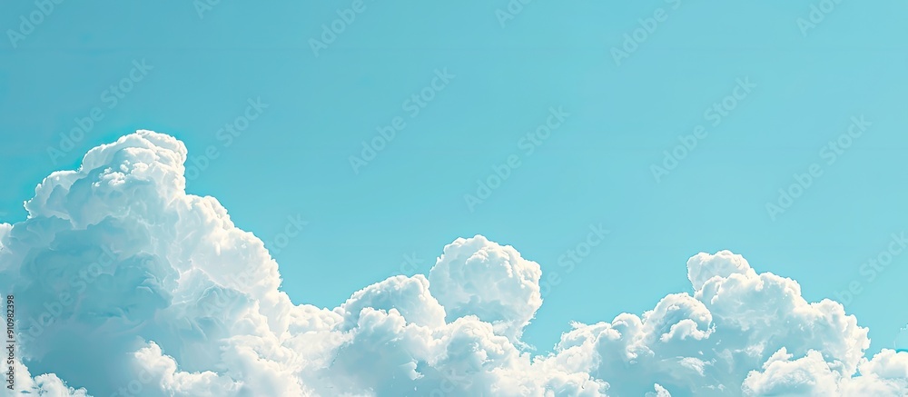 Poster a serene scene of puffy white clouds set against a clear blue sky in summer with room for a copy spa