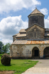 Fototapeta premium The Tsalenjikha Cathedral Church of the Transfiguration of Savior. Arched wall, stone roof.