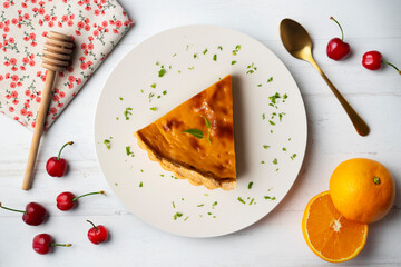Delicious piece of American pumpkin pie in an overhead view.