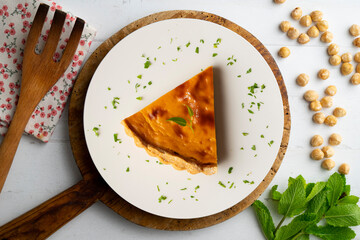 Delicious piece of American pumpkin pie in an overhead view.