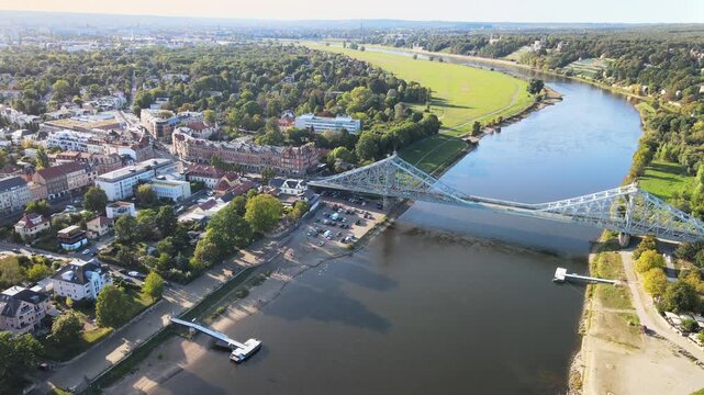 Discover stunning video footage of the Elbe River and Loschwitz Bridge in Dresden, Germany. The video showcases the graceful curves of the river and the elegant architecture of the bridge,