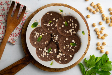 Delicious vegan chocolate cookies made with oats.