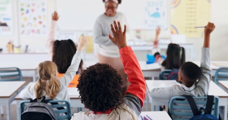 Children, back and hands raised at school for question, answer and learning at youth academy. Kids, education and teacher for development with sign for talking, quiz and scholarship in classroom