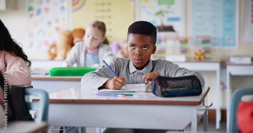 Poster boy, child and writing notes in classroom for learning, knowledge and info for assessment. kid, note