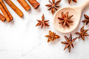 Cooking with spices, vanilla, cinnamon on kitchen table background top view mock-up
